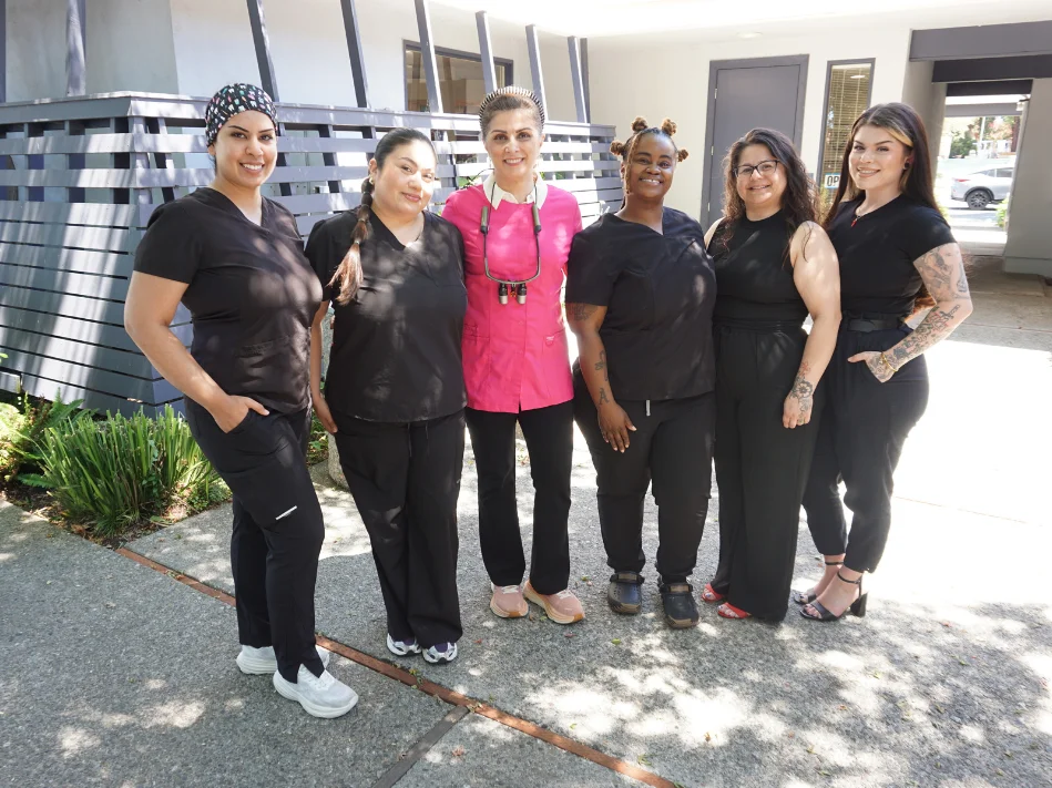 Top Concord Dental team at the Treat Dental Center sign